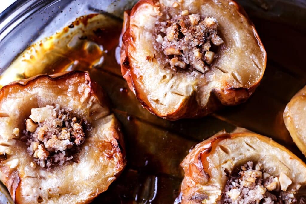 Baked apples with walnuts and caramel syrup
